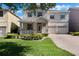 Charming two-story home with well-manicured lawn, covered porch, and a convenient two-car garage at 10097 Lake District Ln, Orlando, FL 32832