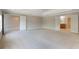 Spacious main bedroom with tray ceilings, carpet floors and access to bathroom at 10097 Lake District Ln, Orlando, FL 32832