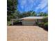 Spacious two-car garage with a brick driveway at 1010 Bolton Rd, New Smyrna Beach, FL 32168