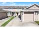 Charming townhome with a one-car garage and a well-manicured lawn and driveway at 10255 Hartford Maroon Rd, Orlando, FL 32827