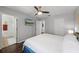 Spacious main bedroom featuring hardwood floors, and an ensuite bathroom at 10255 Hartford Maroon Rd, Orlando, FL 32827