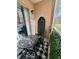 Charming balcony features decorative table and chair, plus an outdoor view at 109 Oyster Bay Cir # 120, Altamonte Springs, FL 32701