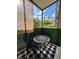 Charming balcony features decorative table and chair, plus an outdoor view at 109 Oyster Bay Cir # 120, Altamonte Springs, FL 32701