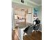 Cozy kitchen featuring white cabinets, sleek appliances, and a stylish breakfast bar with modern seating at 109 Oyster Bay Cir # 120, Altamonte Springs, FL 32701