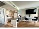 Bright, compact kitchen with white cabinets, modern appliances, and breakfast bar, perfect for efficient meal preparation at 109 Oyster Bay Cir # 120, Altamonte Springs, FL 32701