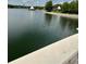 Tranquil lake view showcasing peaceful waters, distant landmarks and pristine shoreline at 109 Oyster Bay Cir # 120, Altamonte Springs, FL 32701