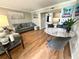 Inviting living room features hardwood floors, modern decor, and neutral paint, creating a welcoming and stylish space at 109 Oyster Bay Cir # 120, Altamonte Springs, FL 32701