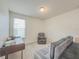 Versatile flex room furnished with a sofa, chair, and desk for multiple uses at 11091 Bagley Aly, Windermere, FL 34786