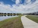Scenic walking path with the view of a lake at 11091 Bagley Aly, Windermere, FL 34786