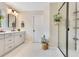 Stylish bathroom featuring large vanity, modern fixtures and a frameless shower at 1127 W Harvard St, Orlando, FL 32804