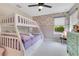 Charming bedroom with bunk beds, floral wallpaper, and plenty of natural light at 1127 W Harvard St, Orlando, FL 32804