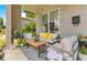Comfortable front porch with cozy seating, stylish decor, and lush landscaping creating a welcoming outdoor space at 1127 W Harvard St, Orlando, FL 32804