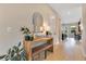 Bright hallway featuring modern decor, sleek hardwood floors, stylish furniture, and natural light creating an inviting space at 1127 W Harvard St, Orlando, FL 32804