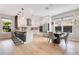 Stylish kitchen featuring a breakfast bar, pendant lights, stainless appliances and a dining area at 1127 W Harvard St, Orlando, FL 32804