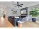 Living room with modern fireplace, hardwood floors and comfortable seating at 1127 W Harvard St, Orlando, FL 32804