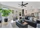 Open concept living room with modern furnishings, large windows, and ample natural light at 1127 W Harvard St, Orlando, FL 32804