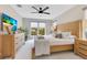 Bright main bedroom with large windows, stylish decor and a ceiling fan at 1127 W Harvard St, Orlando, FL 32804