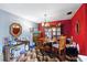 Traditional dining room with elegant chandelier and patterned tile flooring at 114 Floral Dr, Kissimmee, FL 34743