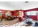 Open-concept living space with comfortable seating, and unique flooring at 114 Floral Dr, Kissimmee, FL 34743