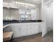 Bathroom featuring a vanity with countertop space, cabinets, double sinks, and shower at 1204 Howell Creek Dr, Winter Springs, FL 32708