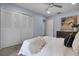 Bedroom featuring carpeted floors, a ceiling fan, and a closet for storage at 1204 Howell Creek Dr, Winter Springs, FL 32708
