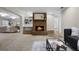 Cozy fireplace with brick surround, built-in shelves, and seamless flow to living area at 1204 Howell Creek Dr, Winter Springs, FL 32708
