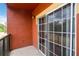 This balcony features a sliding glass door offering privacy and allowing natural light at 122 Vista Verdi Cir # 236, Lake Mary, FL 32746