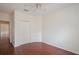 Bedroom with wood floors, ceiling fan, and closet; perfect for storage and organization at 122 Vista Verdi Cir # 236, Lake Mary, FL 32746