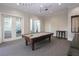Bright game room with a vintage pool table, surrounded by elegant design details at 122 Vista Verdi Cir # 236, Lake Mary, FL 32746