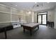 Well-lit game room featuring a classic pool table and ample space for entertainment at 122 Vista Verdi Cir # 236, Lake Mary, FL 32746