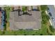Overhead view showing the townhouse's roof, landscaping, and proximity to the street and adjacent properties at 13993 Tarvin St, Orlando, FL 32832