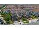 Aerial view of a residential community with neatly manicured lawns and tiled roofs at 13993 Tarvin St, Orlando, FL 32832