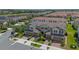 Beautiful townhouse with well-maintained landscaping, a tile roof, and attached garages at 13993 Tarvin St, Orlando, FL 32832