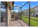 Screened patio with brick flooring and outdoor AC unit at 13993 Tarvin St, Orlando, FL 32832