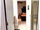 Charming bedroom view through a doorway, revealing unique decor and an inviting space at 1466 Moon Valley Dr, Champions Gate, FL 33896