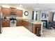 Spacious kitchen with stainless steel appliances and granite countertops at 1466 Moon Valley Dr, Champions Gate, FL 33896