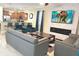Open-concept living space with eat-in kitchen and modern finishes at 1466 Moon Valley Dr, Champions Gate, FL 33896