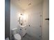 Well-lit bathroom featuring sleek vanity, toilet, and modern fixtures at 16600 Sw 23Rd Avenue Rd, Ocala, FL 34473