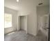Bedroom featuring one window and a closet with bi-fold doors at 16600 Sw 23Rd Avenue Rd, Ocala, FL 34473
