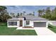 Charming single-story home featuring a gray roof, two-car garage, and a well-manicured lawn at 16600 Sw 23Rd Avenue Rd, Ocala, FL 34473