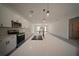 Expansive, light-filled kitchen with a large island, stainless steel appliances, and sleek finishes at 16600 Sw 23Rd Avenue Rd, Ocala, FL 34473
