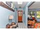 Inviting entryway featuring tile floors, a skylight, and stylish decor at 2299 Nw 135Th Ln, Citra, FL 32113