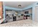 Contemporary kitchen with granite countertops, stainless steel appliances, and plenty of cabinet storage at 2299 Nw 135Th Ln, Citra, FL 32113