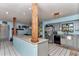 Spacious kitchen with a center island, stainless steel appliances, and seamless transition to dining area at 2299 Nw 135Th Ln, Citra, FL 32113