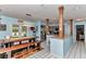 Bright and airy kitchen connects to dining space, featuring modern appliances and ample counter space at 2299 Nw 135Th Ln, Citra, FL 32113