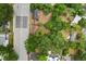 An aerial view shows the property's layout, landscaping, and proximity to nearby amenities at 2312 Corrine Dr, Orlando, FL 32803