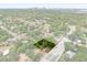 Aerial view of a house on a tree-lined street near downtown with a spacious yard and ample greenery at 2312 Corrine Dr, Orlando, FL 32803