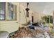 An image of a back porch, covered, featuring a ceiling fan and natural light at 2312 Corrine Dr, Orlando, FL 32803