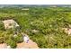 A vast expanse of acreage with mature trees providing privacy, creating a picturesque, tranquil escape at 2705 Curryville Rd, Chuluota, FL 32766