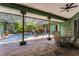 Relaxing outdoor pool area with a waterfall, lush landscaping, and comfortable seating at 2705 Curryville Rd, Chuluota, FL 32766
